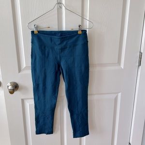 Prana capri leggings with decorative seams — turquoise size small